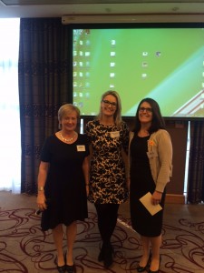 ISCM President Dr Eleanor McNamara congratulates joint oral presentation winners, Dr Breda Lynch and Dr Rachel Grainger