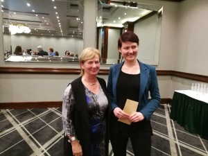 ISCM President, Dr Eleanor McNamara congratulates winner of the oral presentation prize, Blathanid Mahon